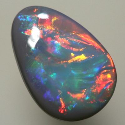 SOLID BLACK OPAL Very bright cherry reds move all over the face of the opal SEE VIDEO